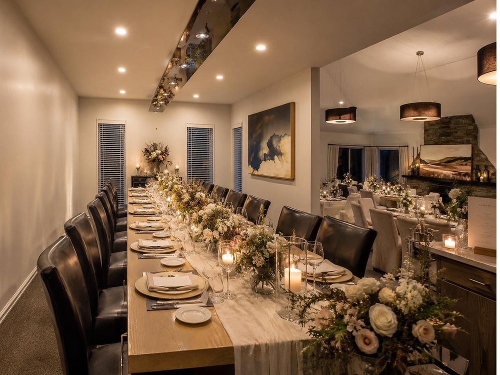 A long table set for dinner in the entertaining room at Mishika Retreat